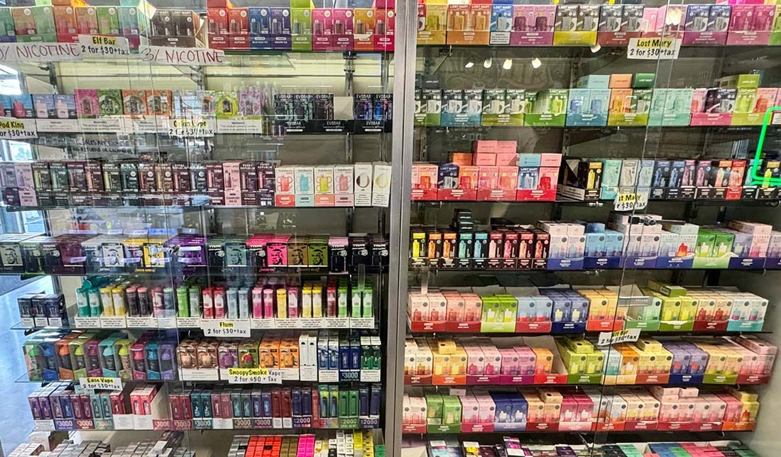 A display of various disposable vapes available for wholesale purchase